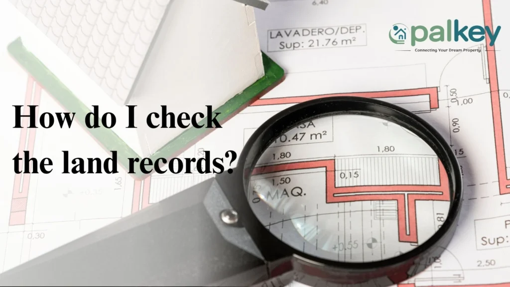 A promotional graphic for "Opalkey," a real estate service, with the question "How do I check the land records?". The image features a magnifying glass over a blueprint of a building or a plot layout. A small model of a house is visible in the background. The "Opalkey" logo is in the top right corner.
