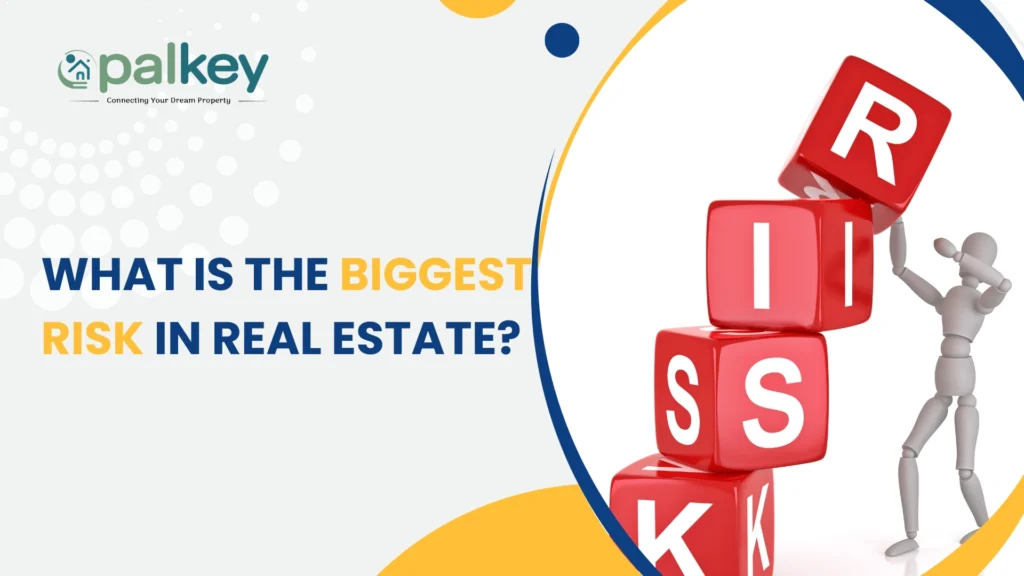 A promotional graphic for "opalkey" with the question "WHAT IS THE BIGGEST RISK IN REAL ESTATE?". The image shows a small figurine balancing a precarious stack of red blocks with the letters "RISK" on them. The background is a mix of white, yellow, and blue, with the "opalkey" logo at the top.