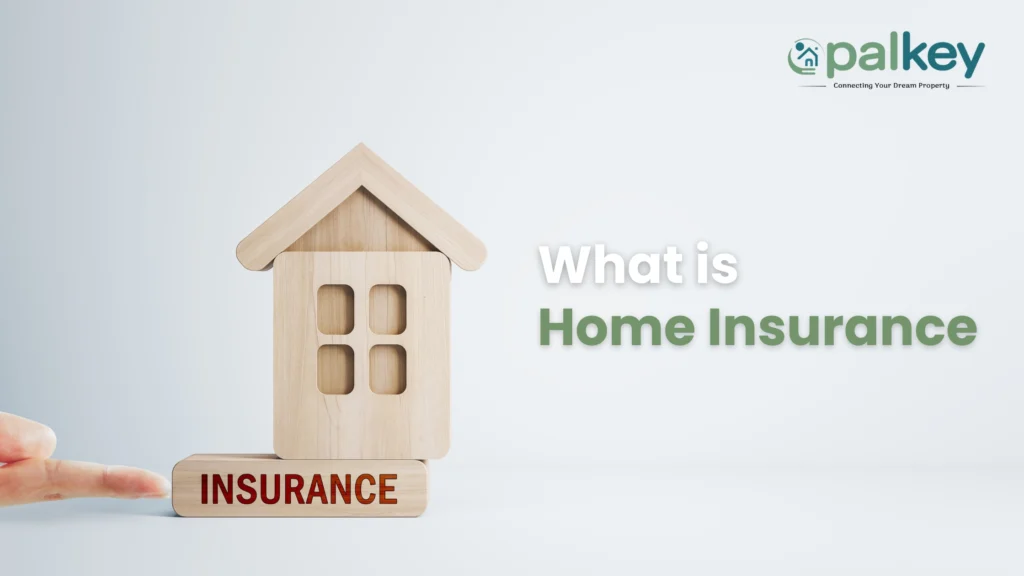 A promotional graphic for "Opalkey" with the question "What is Home Insurance?". The image features a hand pointing at a wooden model house resting on a wooden block with the word "INSURANCE" carved in red letters.