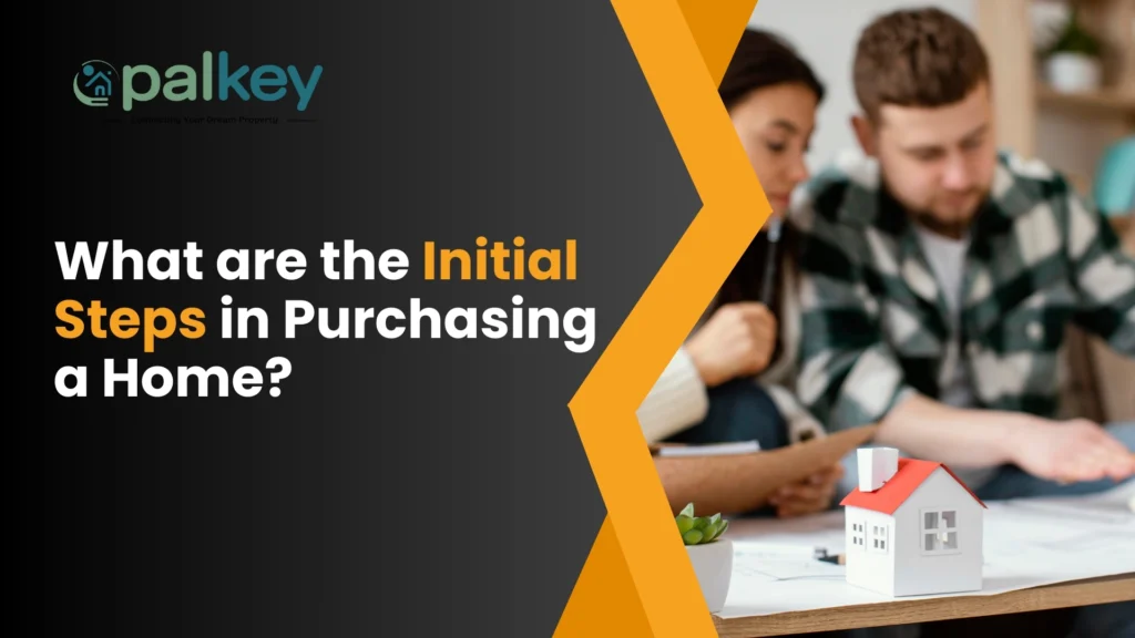 A promotional graphic for "opalkey" with the question "What are the Initial Steps in Purchasing a Home?". The image features a couple sitting at a table with a small model house and blueprints, suggesting they are planning to buy a home. The background is a mix of orange and dark gray. The "opalkey" logo is in the top left corner.